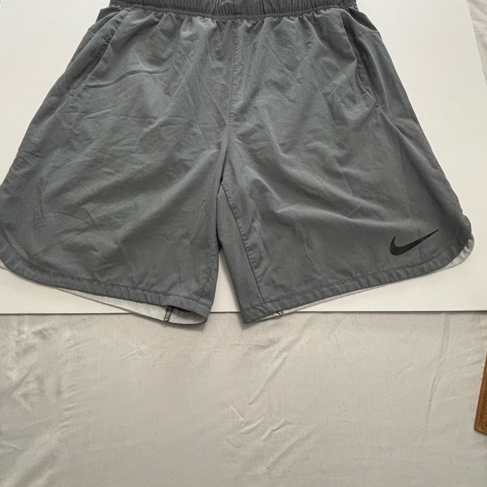 Nike Men’s Gray Athletic Shorts with Black Swoosh